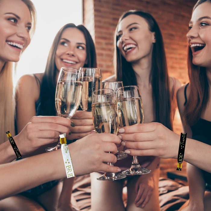 16 Black and Gold Team Bride Hen Party Wristbands and 1 Bride to Be Wristband
